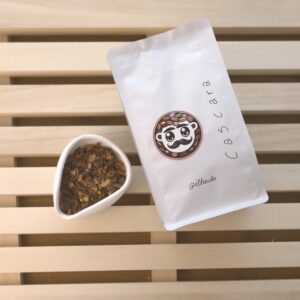 Showcase of the cascara product alongside a sealed bag of cascara
